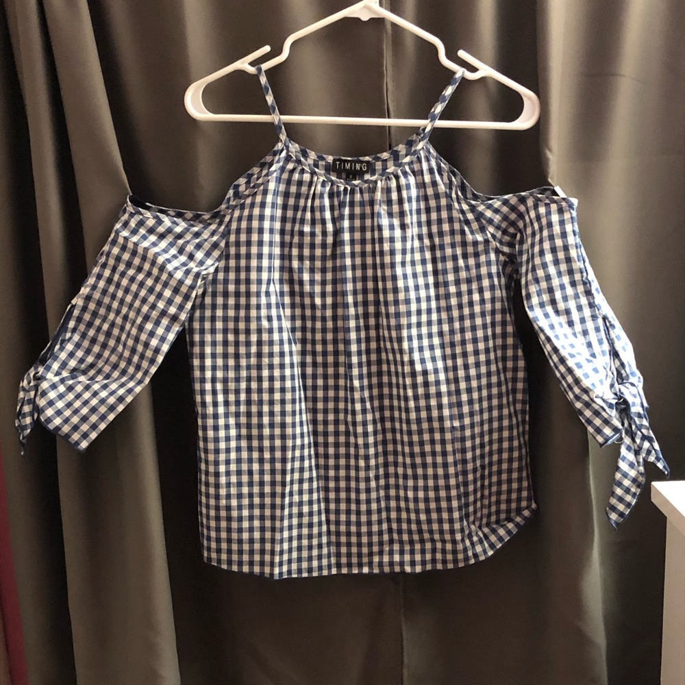 Blue and white plaid shirt